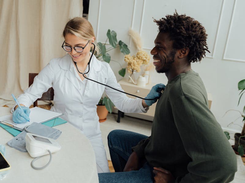 Doctor consulting with patient in a modern clinic